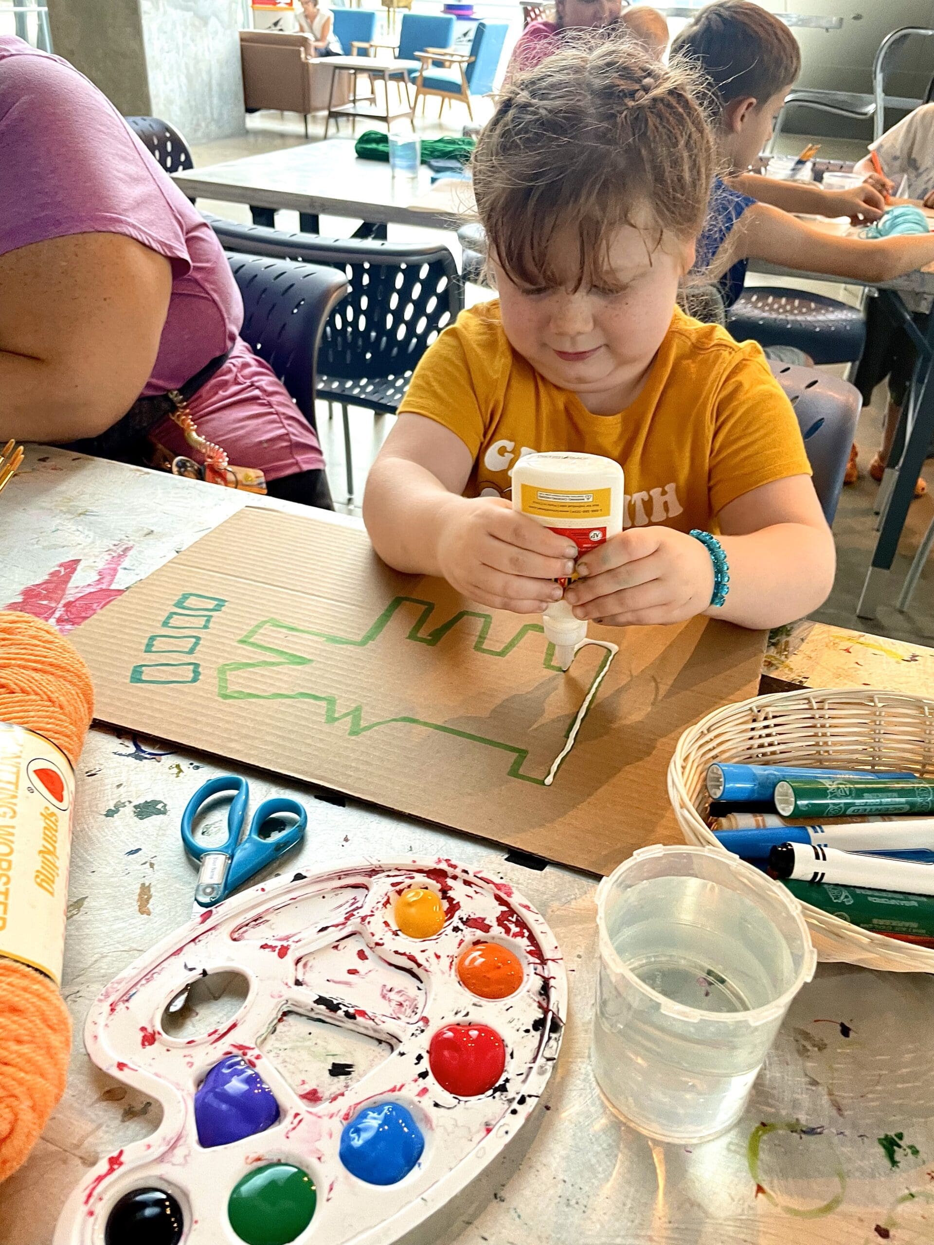 A child working on an art project.