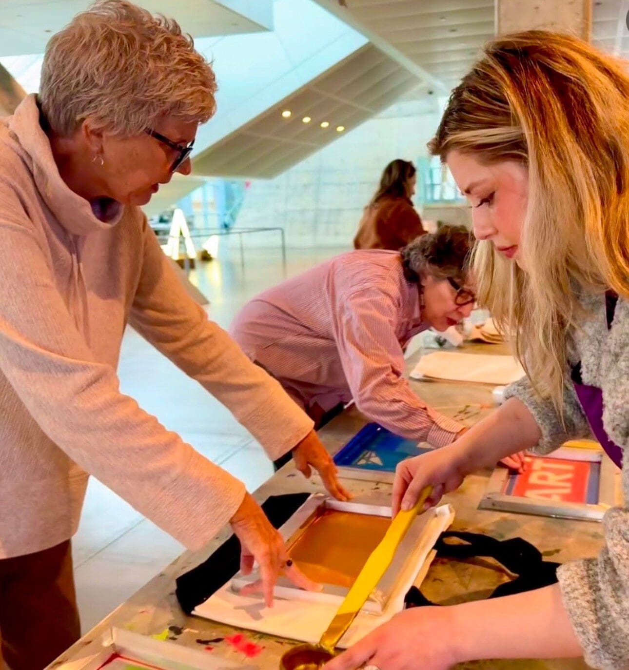 Guests screenprinting at the Akron Art Museum