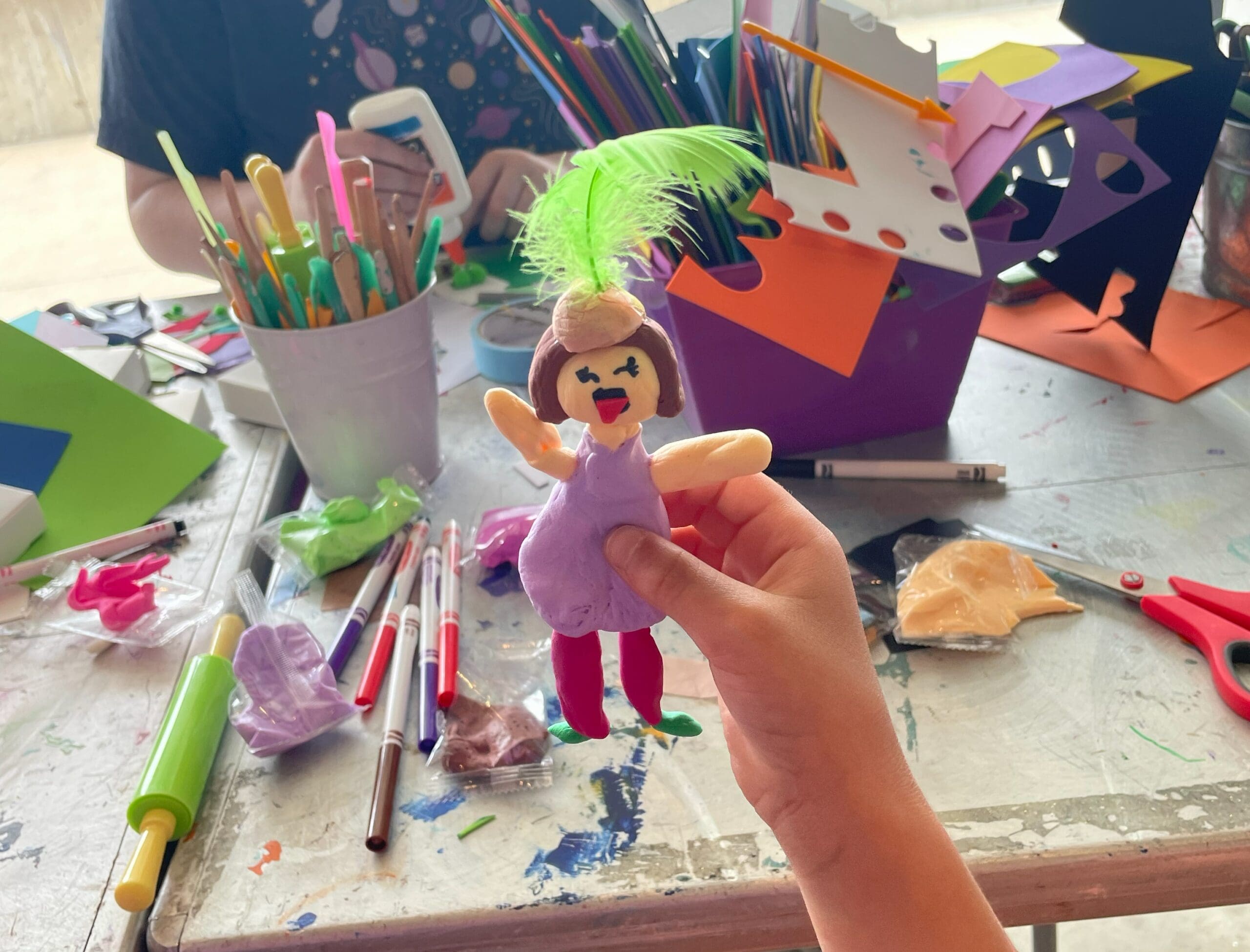 Children making small sculptures at the Akron Art Museum