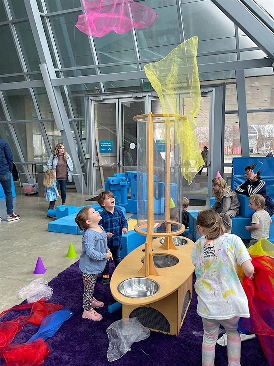 Young children having fun at an art activity at the Akron Art Museum