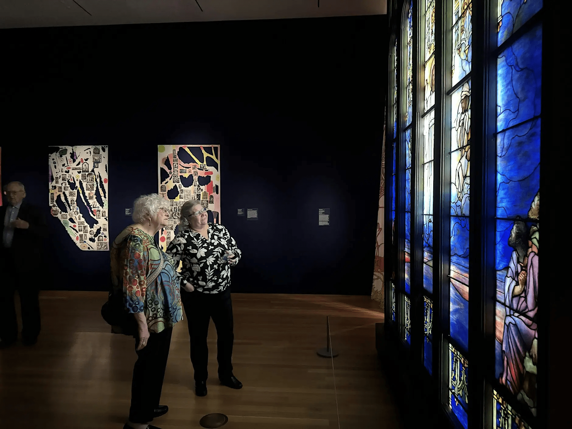 Visitors viewing the stained glass at the Akron Art Museum