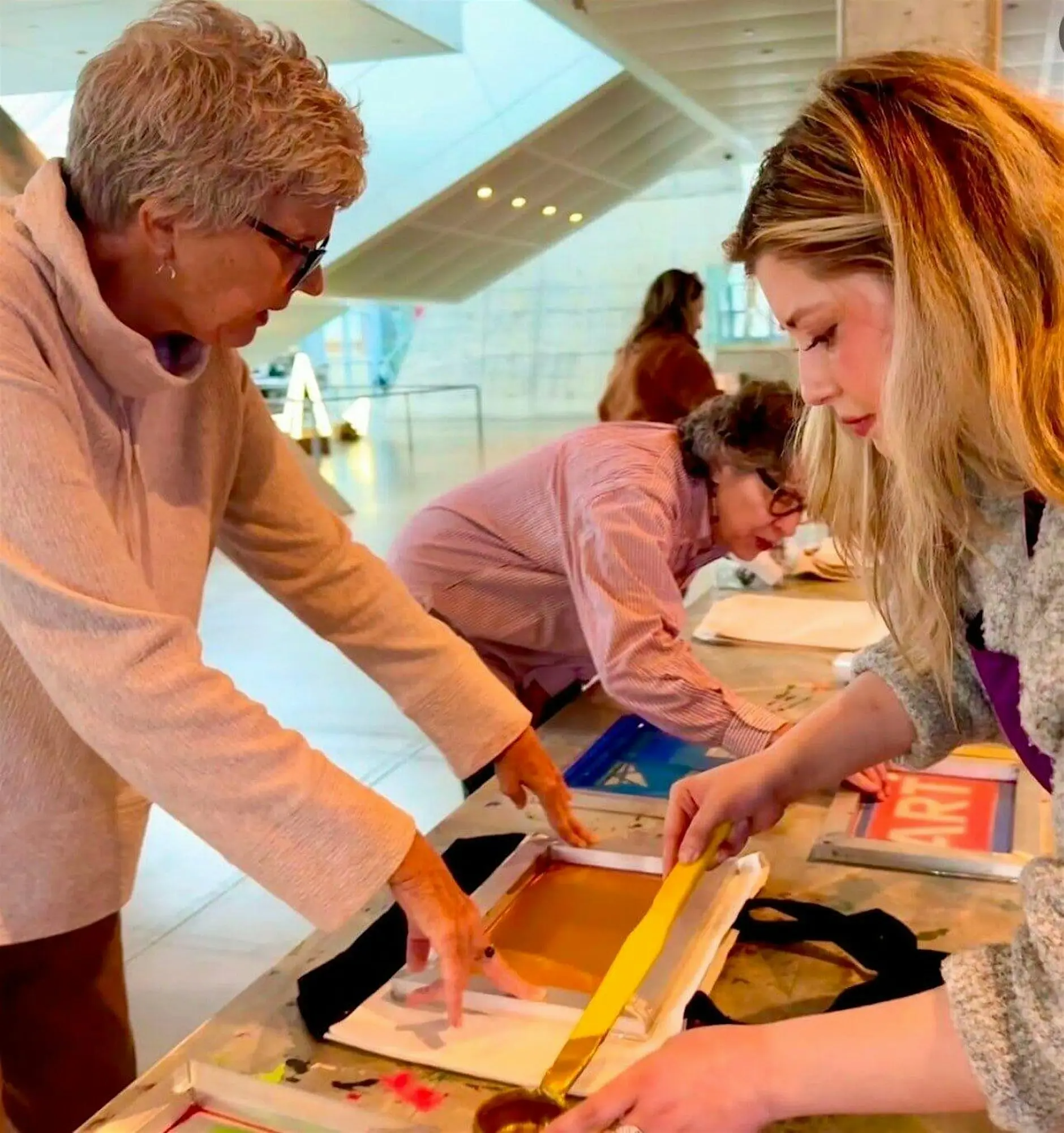 Members enjoying screenprinting at the Akron Art Museum