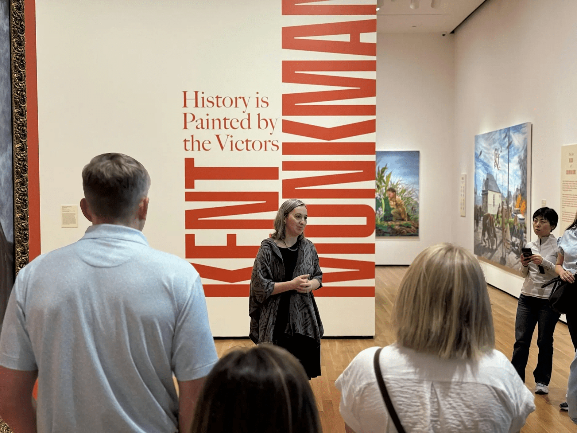 A curator at the Akron Art Museum giving a talk.